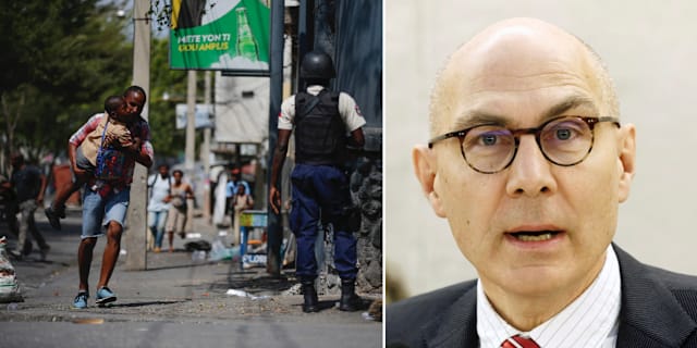 En man springer iväg med sin son/Volker Türk. TT