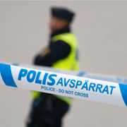 Lagbok och domarklubba/polis vid avspärrning