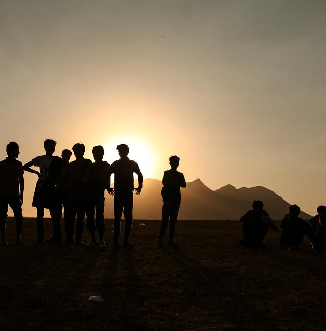  Young men who say they deserted the Afghan military and fled to Turkey through Iran stand in the countryside in Tatvan, in Bitlis Province in eastern Turkey, Tuesday, Aug. 17, 2021. Emrah Gurel / AP