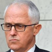 Polisen vid antiterrorinsats och Australiens premiärminister Malcolm Turnbull.