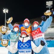 Det norska laget firar sitt OS-guld.