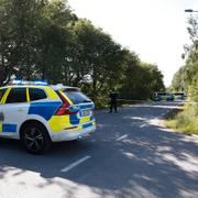 Polisbilar där bilolyckan inträffade. 