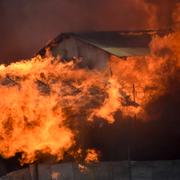 Byggnader har satts i brand i de kinesiska kvarteren. 