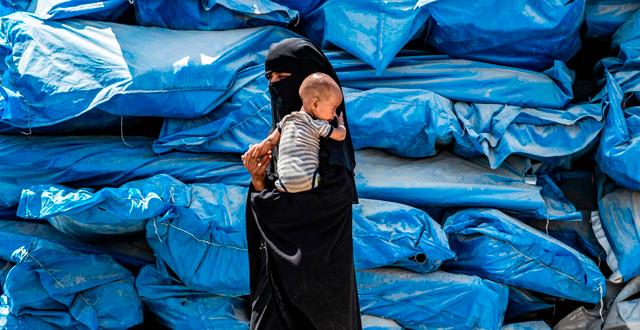 Kvinna med barn i Syrien. DELIL SOULEIMAN / AFP