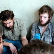 Tjostolv Moland och Joshua French intervjuades av journalister innan domen avkunnas i Kisangani den 8 september 2009.