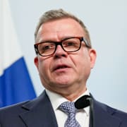 Rysslands president Vladimir Putin och Finlands premiärminister Petteri Orpo.