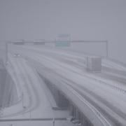 Sundsvallsbron i snöoväder.