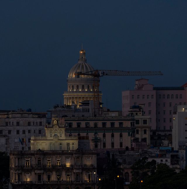 A construction crane stands next to the Capitol in Havana, Cuba, Wednesday, June 22, 2022.  Ramon Espinosa / AP
