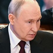 Vladimir Putin och Dmitrij Peskov.