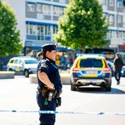 Polisen på brottsplatsen. 