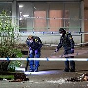 Polisens tekniker arbetar på platsen.