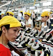 Nike-fabrik i Vietnam.  RICHARD VOGEL / AP