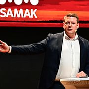 Arkivbild från mars: Socialdemokraternas partisekreterare Tobias Baudin (S) talar när den nordiska arbetarrörelsens samarbetskommitté håller kongress i Stockholm.
