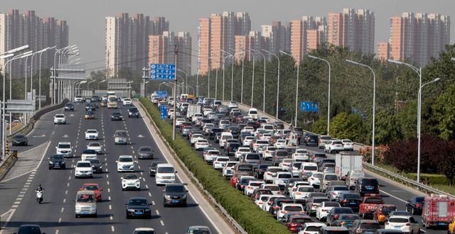 Illustrationsbild. Biltrafiken i Peking. Ng Han Guan / AP