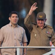 Raúl Castro med sitt barnbarn. Marco Rubio.