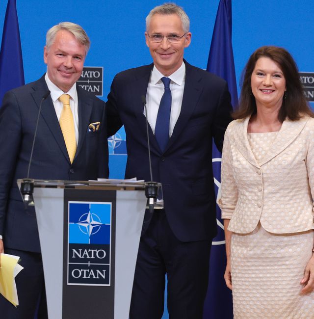 Finland's Foreign Minister Pekka Haavisto, left, Sweden's Foreign Minister Ann Linde, right, and NATO Secretary General Jens Stoltenberg attend a media conference after the signature of the NATO Accession Protocols for Finland and Sweden in the NATO headquarters in Brussels, Tuesday, July 5, 2022.  Olivier Matthys / AP