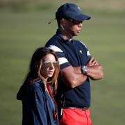 Tiger Woods och Erica Herman/Arkivbild