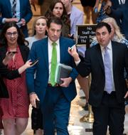 I grön slips syns Republikanernas huvudförhandlare Garret Graves. J. Scott Applewhite / AP