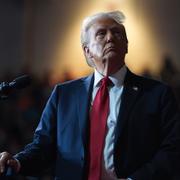 Donald Trump watches a video screen at a campaign rally at the Salem Civic Center, in Salem, Va, Nov. 2, 2024.