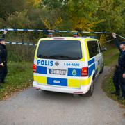 Poliser vid brottsplatsen i Vallåkra 15 oktober 2015.