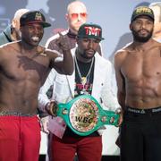 Adonis Stevenson och Badou Jack på fredagens invägning.