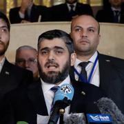 Arkivbild: Mohammed Alloush, ledare för den syriska oppositionsdelegationen, talade till medierna efter den förra omgången av fredssamtal i Astana i januari. 