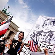 Protester mot USA i Berlin från 2020.