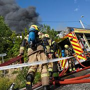 Brandkåren på plats vid branden.