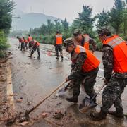 Sanering efter förra veckans regnkaos i Peking.