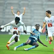 Luzerns Nicky Beloko och Kevin Spadanuda mot Djurgårdens Joel Asoro.