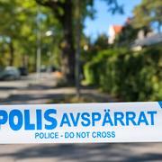 Polisavspärrningar på platsen. 