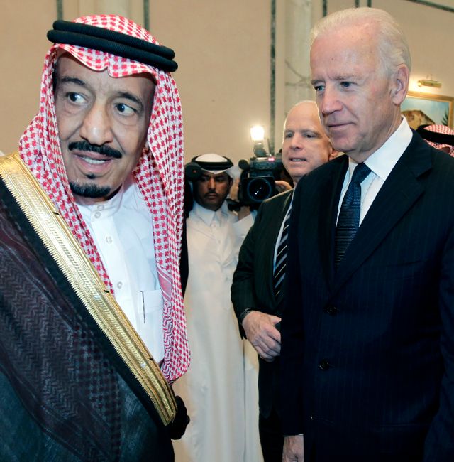 Then-U.S. Vice President Joe Biden, right, offers his condolences to then-Prince Salman bin Abdel-Aziz upon the death of his brother, Saudi Crown Prince Sultan bin Abdul-Aziz, at the Prince Sultan palace in Riyadh, Saudi Arabia, Oct. 27, 2011. Hassan Ammar / AP