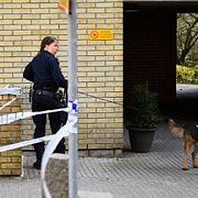 Polis vid parkeringshuset i centrala Lund där kvinnan hittades den 19 april 2016.