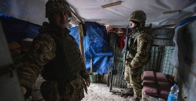 Ukrainska soldater vid gränsen.  Andriy Dubchak/AP/TT