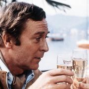 Michael Caine och Cybill Shepherd i filmen De smartaste från 1978. Caine är den brittiska manliga skådespelaren som haft flest filmroller.