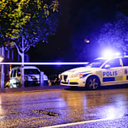 Polisens avspärrningar efter skjutningen. 