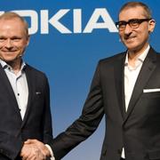Nokias nye vd Pekka Lundmark tillsammans med avgående vd Rajeev Suri.