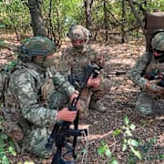 Ryska krypskyttar vid fronten.