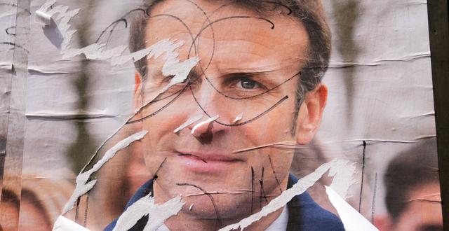 Macron på en valaffisch. Francois Mori / AP