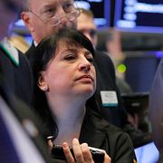 Tradern Phyllis Arena Woods påthe New York Stock Exchange. Arkivbild.