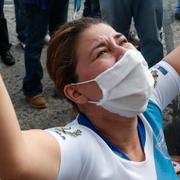 Bild från protester i Guatemala City i helgen. 