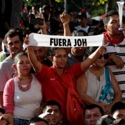 Demonstranter i staden San Pedro Sula. 