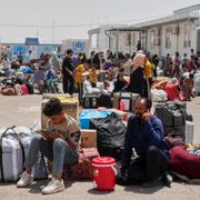 Afghanska flyktingar vid gränsövergången Islam Qala i Afghanistan, 20 juni 2025. 