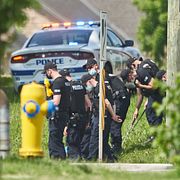 Polisen vid brottsplatsen i London, Kanada.