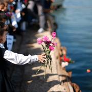 Palestinska skolbarn hedrar offren vid båtolyckan utanför Lampedusa.