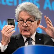 European former Commissioner for Internal Market Thierry Breton holds up raw materials during a media conference in 2023.