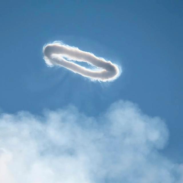 A vapor ring rises from a volcano.  GIO GIUSA / NYT