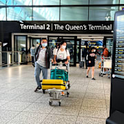 Passagerare på Heathrow. Alberto Pezzali / AP