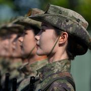 Medlemmar av en kinesisk milisavdelning under övningar inför militärparaden (20 augusti).