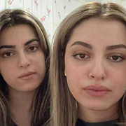 Rök stiger över Teheran på lördagsmorgonen. Till höger Darya och Donya.